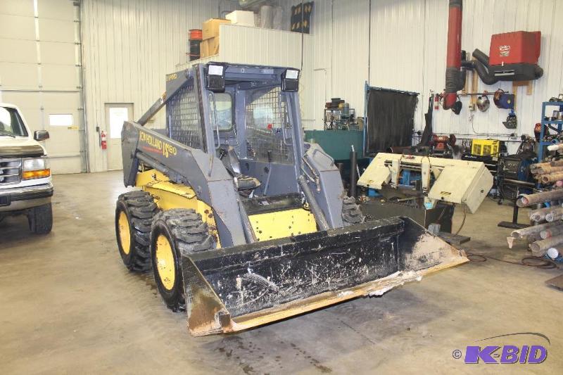 lot 2 image: New Holland LS 180 Skid Loader, 30 Day Warranty