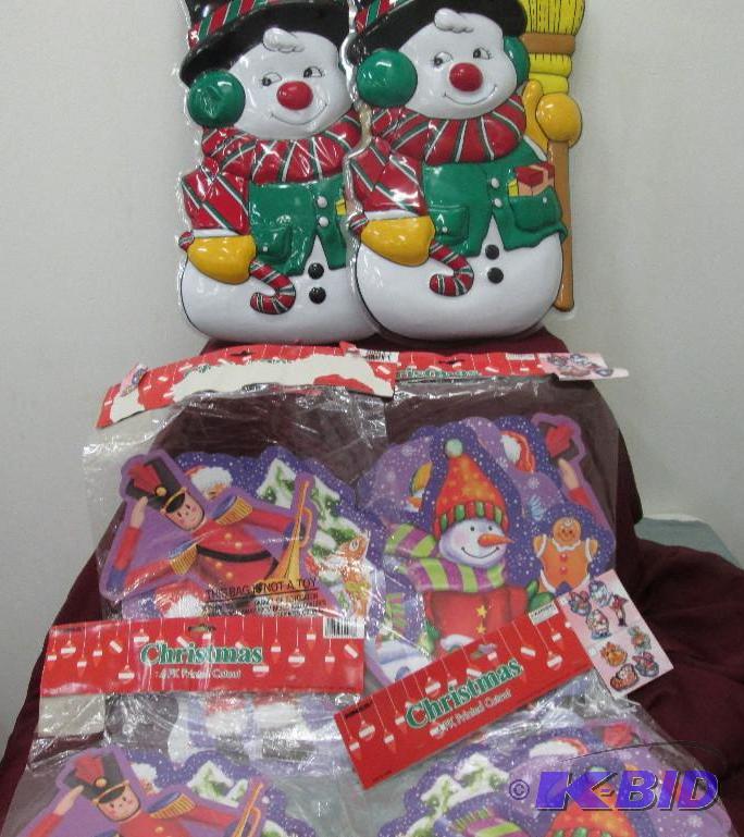 Plastic snowman cutout and 4 pkg. of cardstoc...
