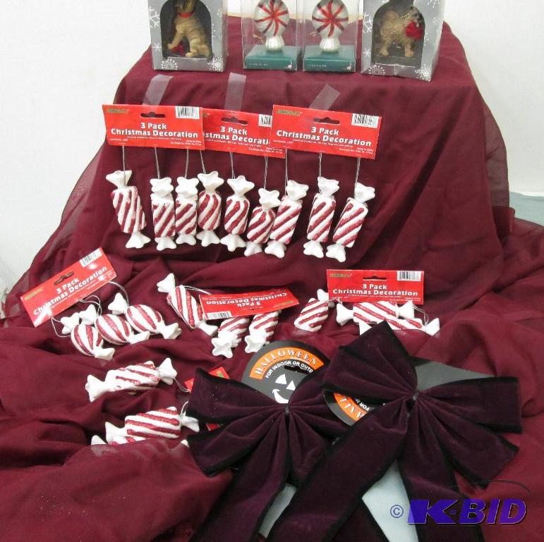 Candy tree ornaments and dog ornaments and bo...