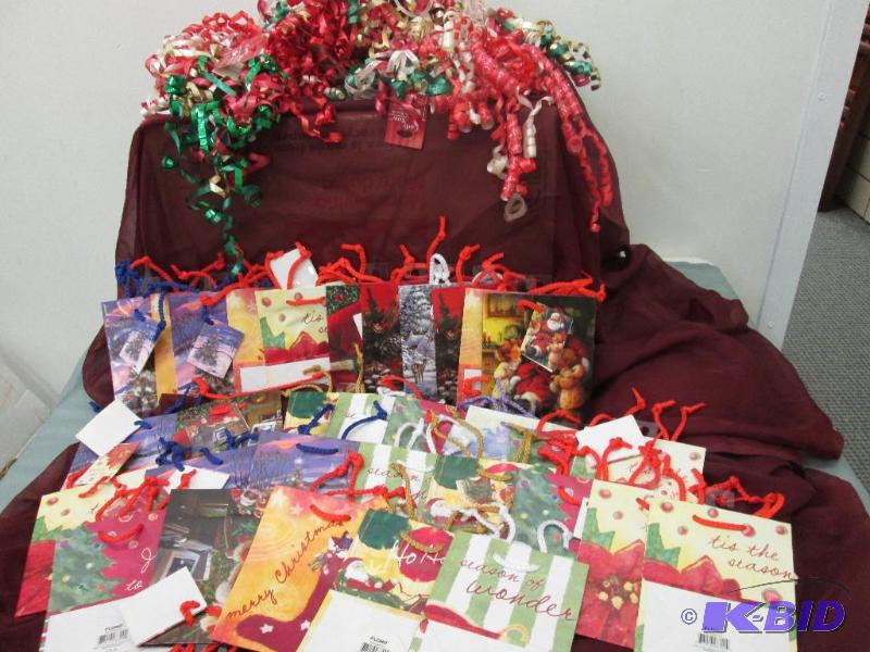 32 small size gift bags amd misc. curl ribbon...