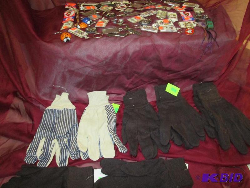 collection of keychains and 7 pair of work gl...