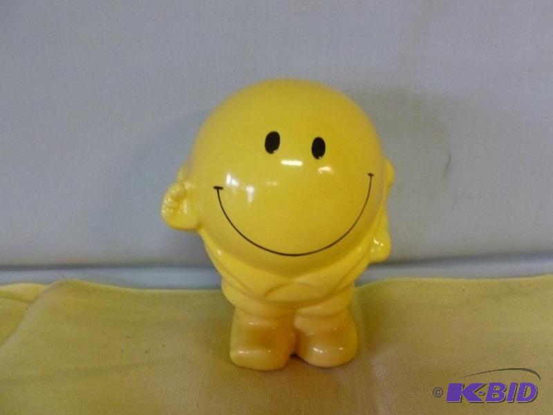 lot 161 image: Nice smiley face porcelain coin bank that mea...