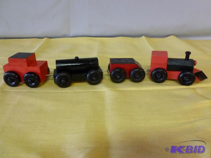 lot 164 image: Nice four piece custom made wooden train set....