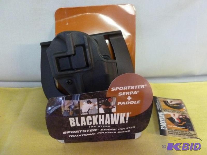 lot 187 image: Blackhawk polymer pistol holster, looks like ...