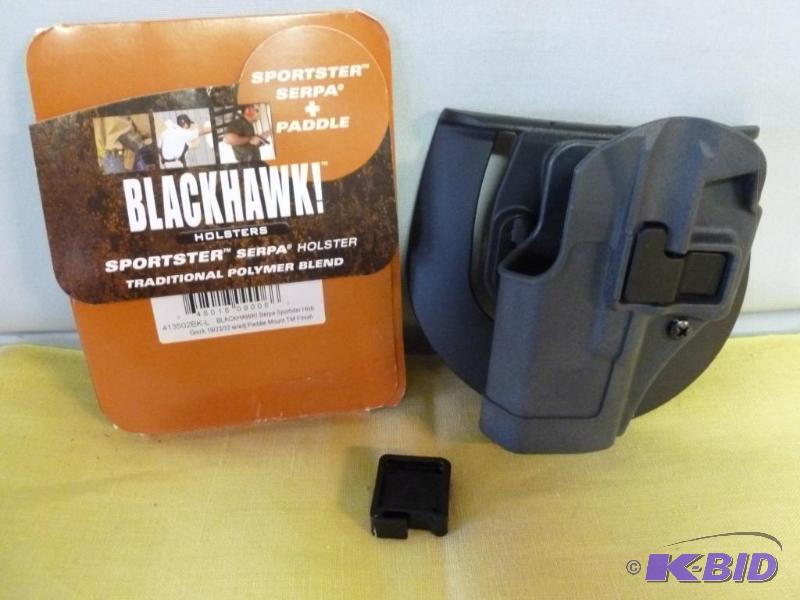 lot 188 image: Blackhawk polymer pistol holster, looks like ...