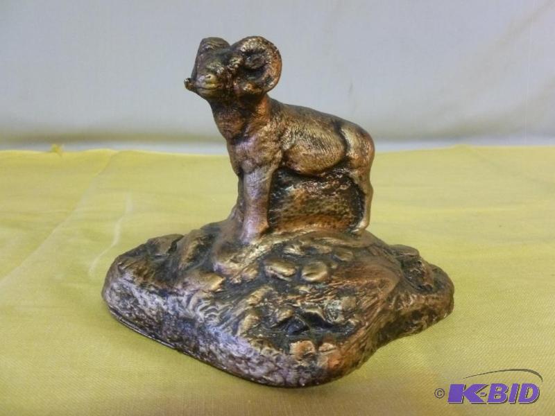 lot 200 image: Nice hand crafted ram mantle decoration that ...