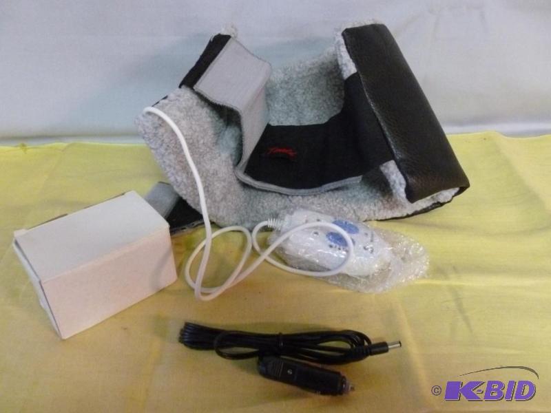 lot 218 image: Tenold back heating pad, 12v and 110v, works....