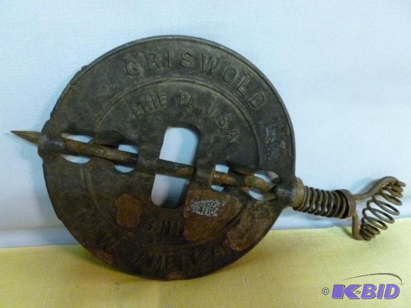 lot 233 image: Vintage Griswold cast iron stove damper that ...