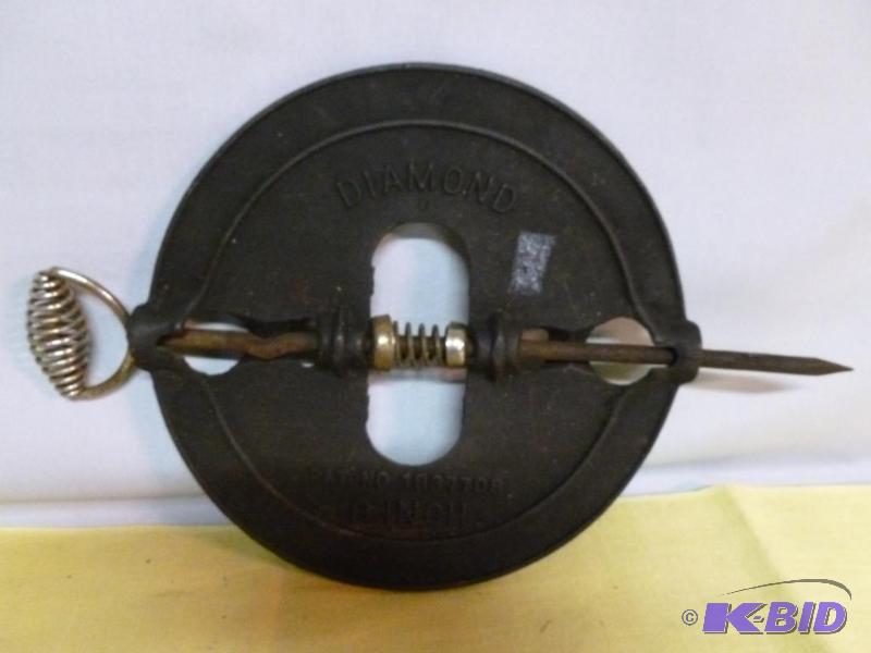 lot 234 image: Vintage Adams Co. cast iron stove damper that...