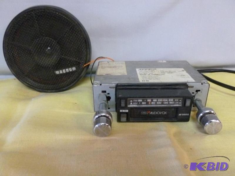 lot 48 image: This lot consists of an Audiovox car radio mo...