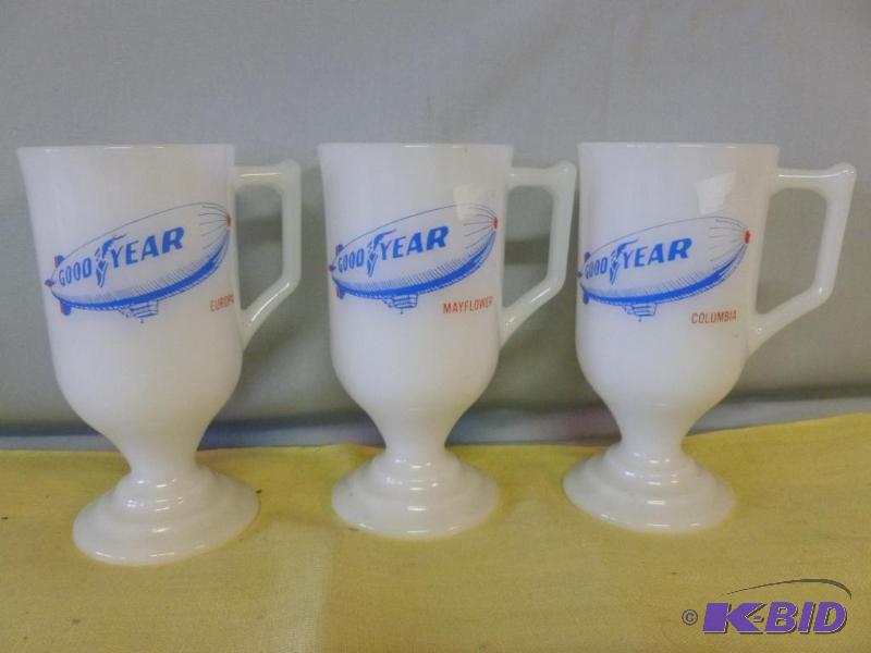 lot 64 image: Lot of three collectible Good Year milk glass...