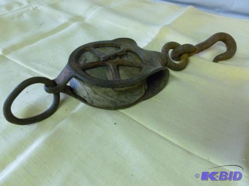 lot 88 image: Vintage iron bodied and wooden wheel barn pul...