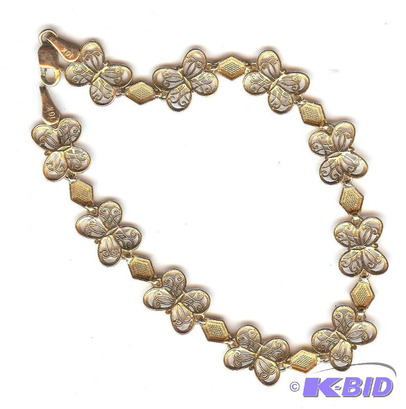 10 KT Two tone filigree butterfly bracelet 2....