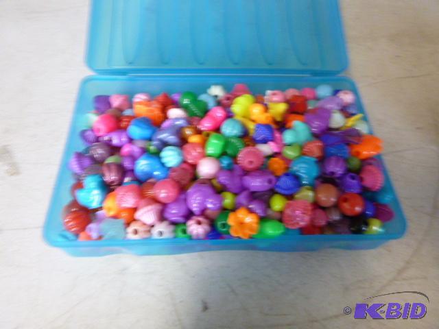 lot 107 image: Container Full of Craft Beads...