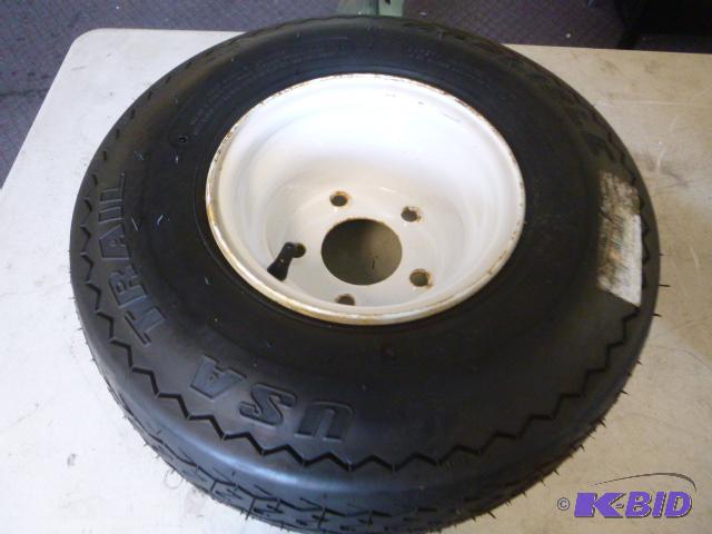lot 12 image: Carlisle USA Trail Tire 5 bolt rim, 18.5X8.5-...