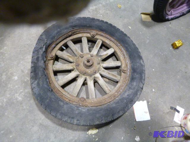 lot 161 image: Model T Tire and Rim...