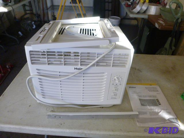lot 51 image: New Haier Air Conditioner Model HWF05XCL-L - ...