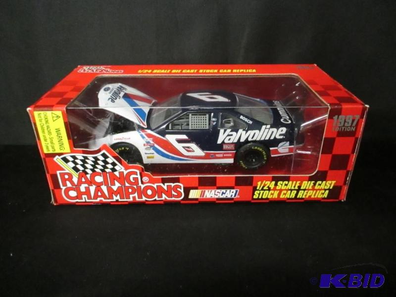lot 16 image: 124 #6 Valvoline Racing Champions NASCAR Die cast Stock Car Replicia. 1997 Edition