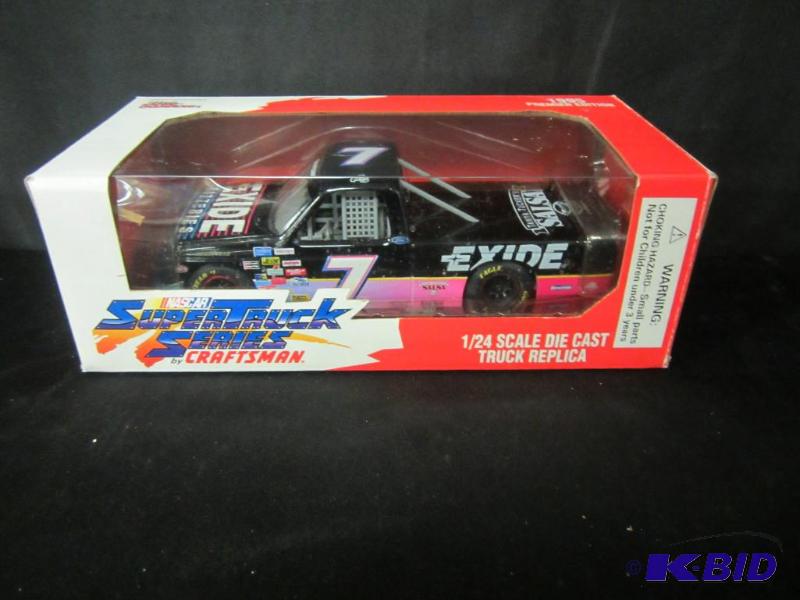 lot 21 image: Craftsman 124 NASCAR Super Truck Series 1995 Premier Edition #7 Exide Batteries die cast truck