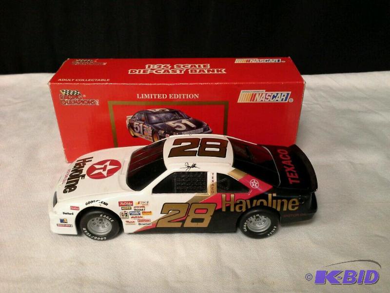 lot 63 image: Racing champions number 28 Valvoline 1 24 diecast bank