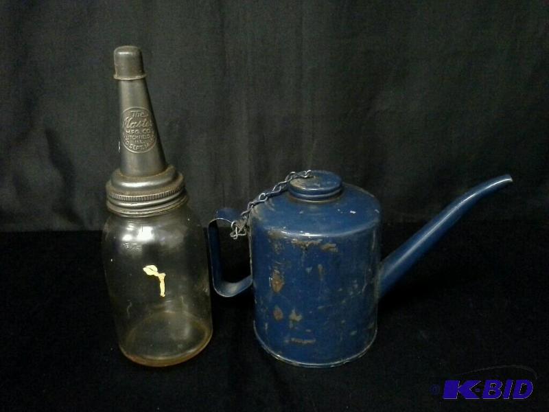 lot 93 image: 2 vintage oil containers
