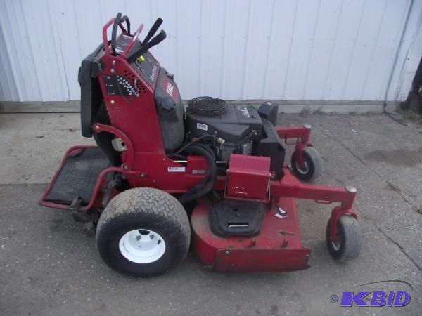 lot 12 image: Toro Grandstand 48" Commercial Lawn Mowe...