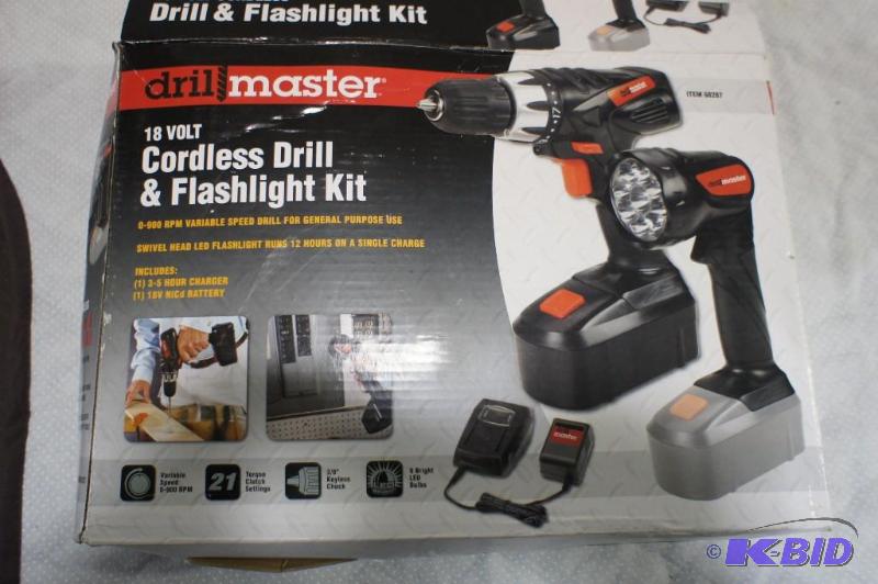 lot 35 image: Drill Master 18 Volt Cordless Drill & Fla...