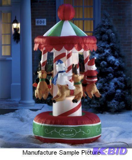 lot 27 image: Inflatable Christmas Merry Go Round  - Everyo...