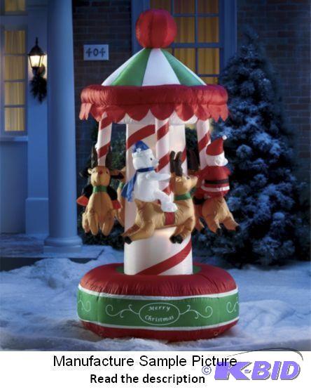 lot 36 image: Inflatable Christmas Merry Go Round  - Everyo...
