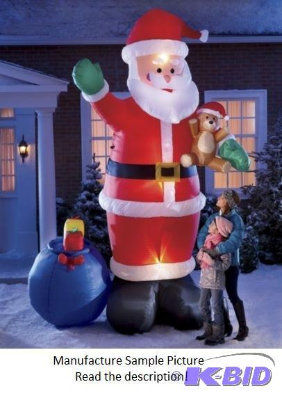 lot 4 image: Inflatable 12 Foot Santa with Bag of Toys - 5...