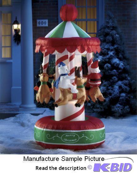 lot 47 image: Inflatable Christmas Merry Go Round  - Everyo...