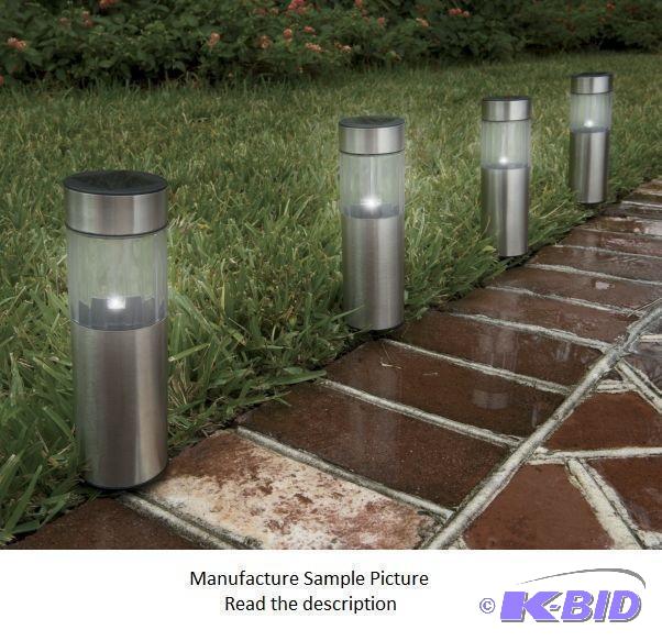 lot 72 image: Four Solar Lights - Light the way with these ...