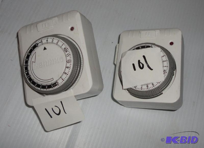 lot 101 image: Pair of electric wall timers...