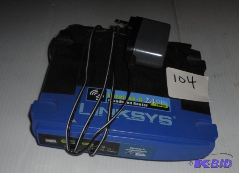 lot 104 image: Linksys WRT-54G Wireless router...