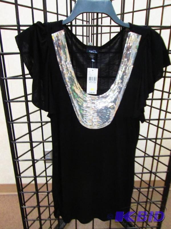 lot 1 image: Ladies Rue 21 top, size medium MSRP $48.00...