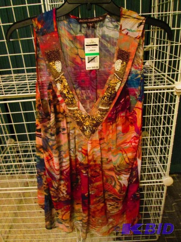 lot 133 image: Mushkaby Sienna Hose Inc Ladies top, MSRP $68...