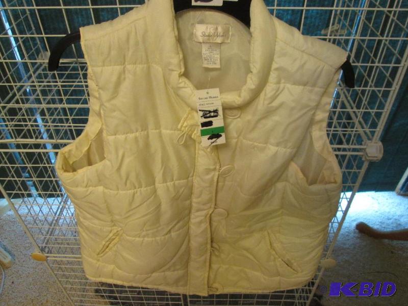 lot 232 image: Studioworks ladies vest, size L MSRP $46.00...