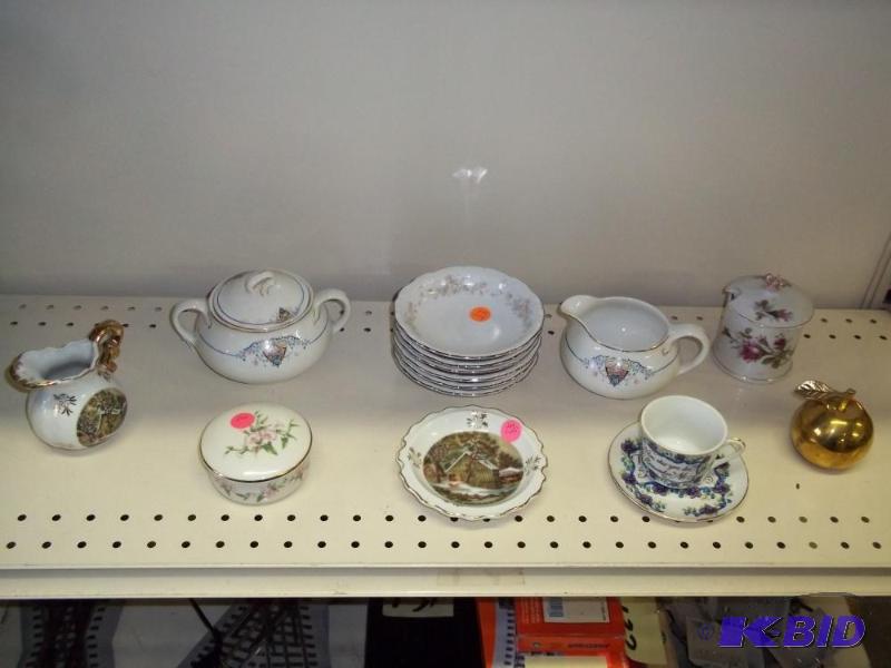 Assorted vintage cups and saucers with cream ...