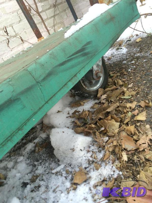 lot 16 image: Green warehouse cart 2x4 with air filled tires