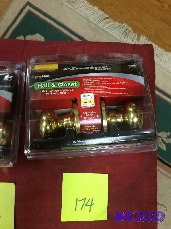 lot 174 image: Master Lock HallCloset Bright Brass finish doorknob