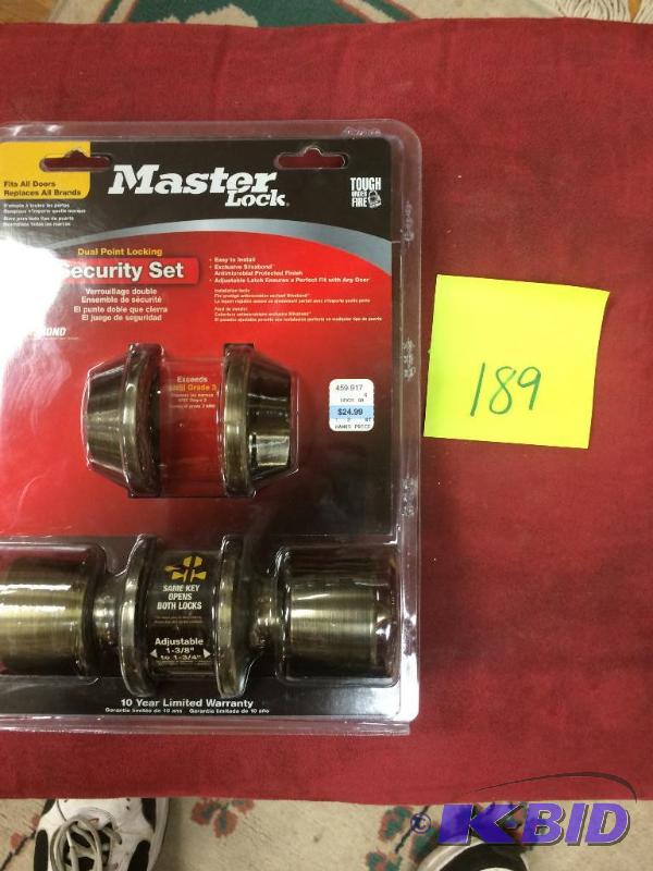 lot 189 image: Master Lock Security Set, doorknob and deadbolt Antique Brass finish