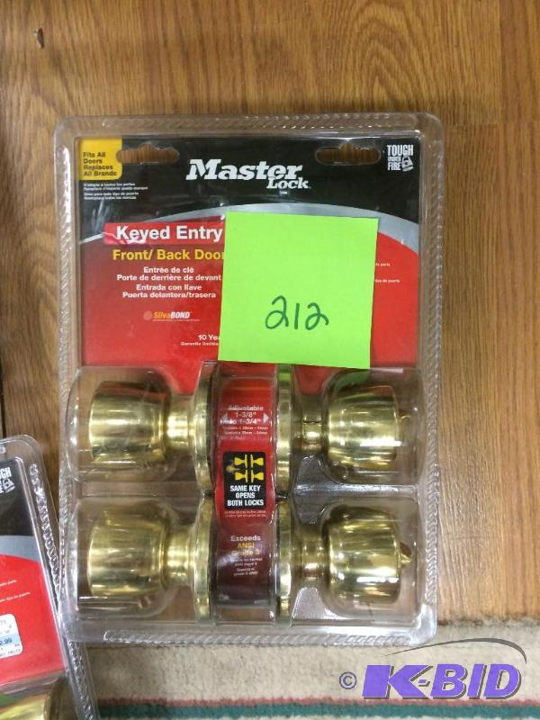 lot 212 image: Master Lock Keyed Entry Front and Back Doors Set Polished Brass Finish