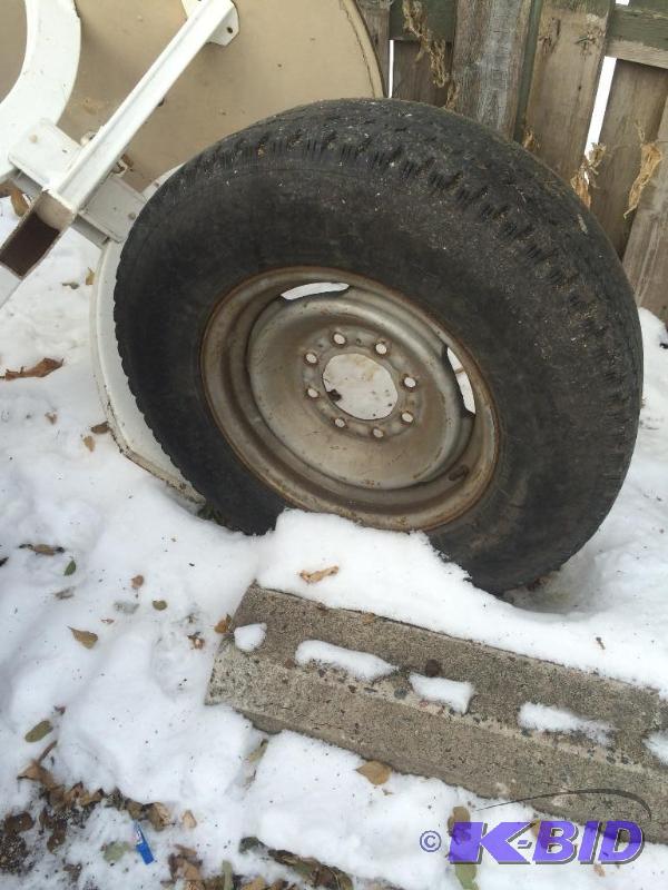 lot 23 image: 8 lug chevy wheel