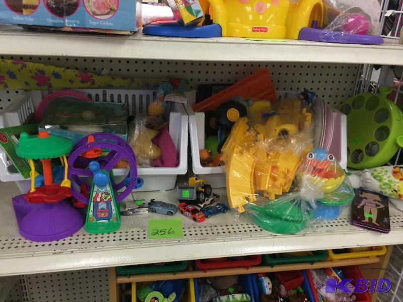 lot 256 image: toys and bins on shelf