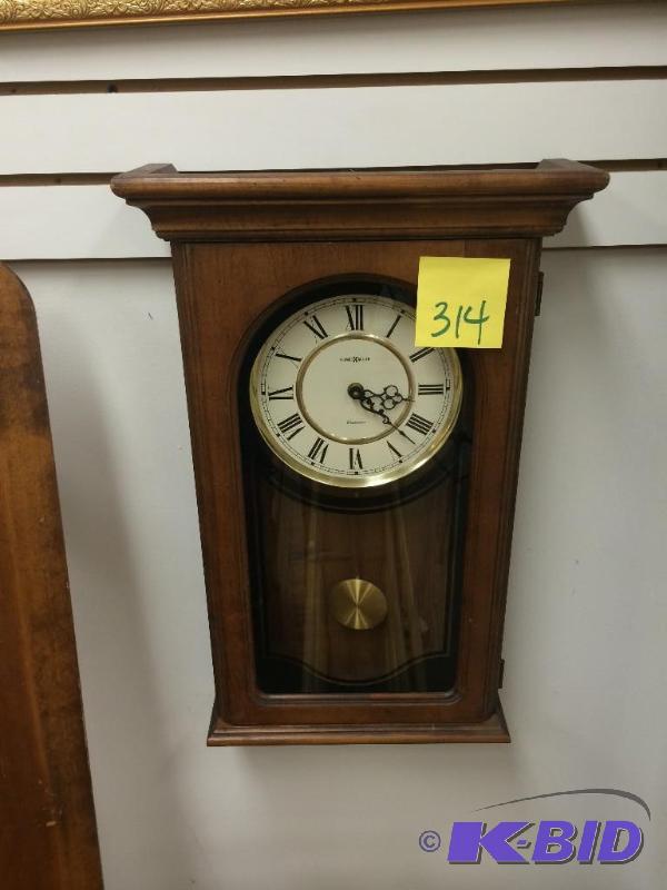 lot 314 image: Howard Miller chiming wall clock