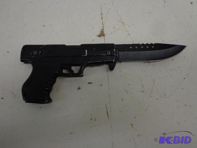 lot 54 image: Handgun Shaped Knife   Black Knife shaped lik...