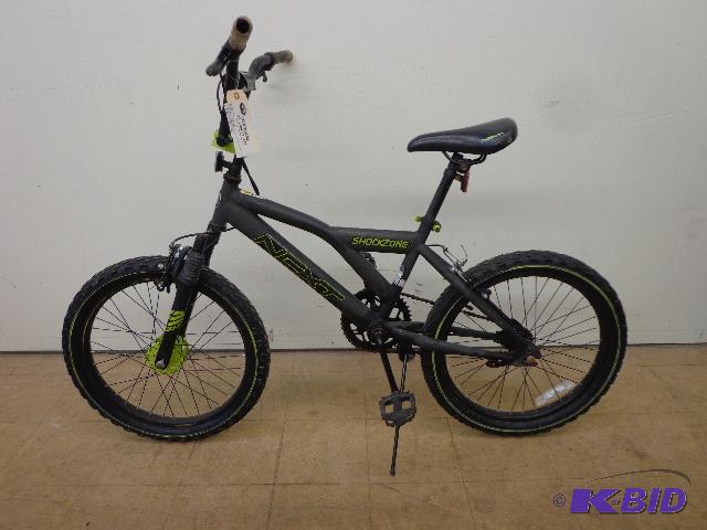 lot 7 image: Next Shock Zone Peddle Bike   20"  Front...