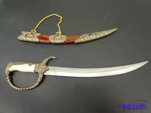 lot 74 image: Curved Dagger    Overall Length 16"...