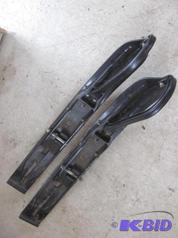 2 Plastic Skis with Duel Carbide Runners