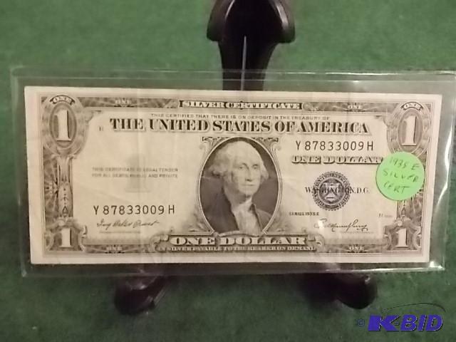 lot 16 image: US $1 Silver Certificate 1935 E Series...